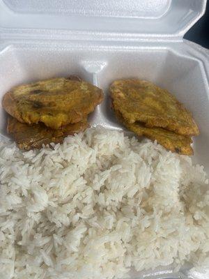 White rice and banan peze (fried plantains)