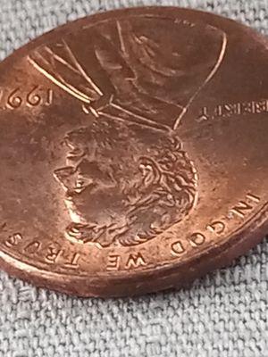 Another face on the penny