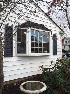 Installing a bay window.