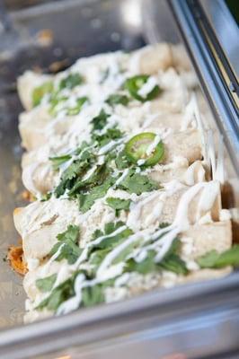 Chicken and black bean enchiladas for a mexican themed wedding