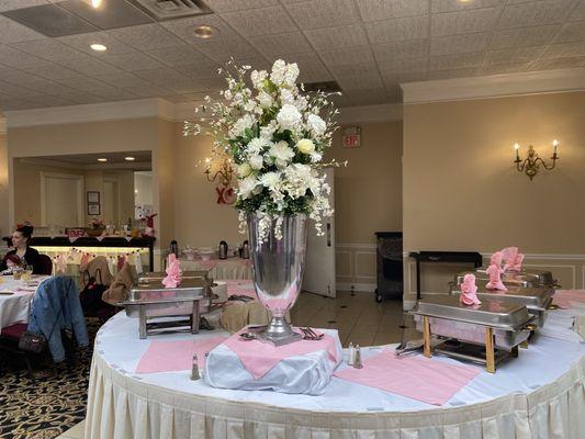 Just part of the delicious food  tables with the beautiful flower arrangement!