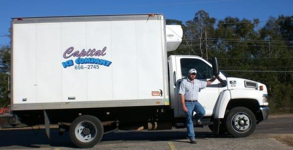 Professional deliveryman and clean trucks.