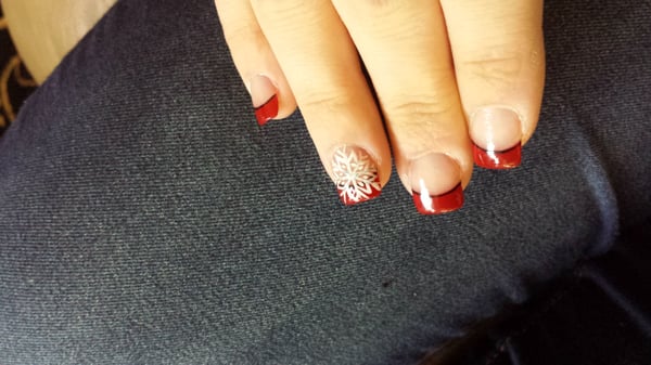 Hand painted snowflake on a Christmas mani. . Thank you Rose Nails!