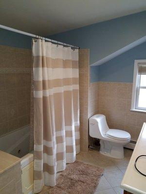 Bathrooms painted and regrouted and fixtures installed