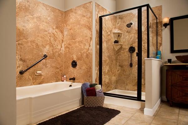 Master bathroom with separate tub and shower.  Framed enclosure.  Displays our beautiful stone-look acrylic.