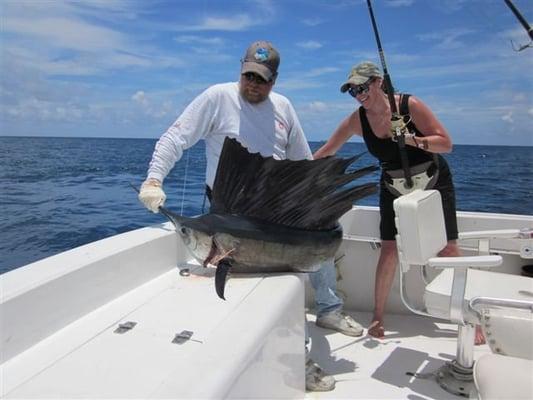 sailfish captured on light tackle and released with smiles all around.