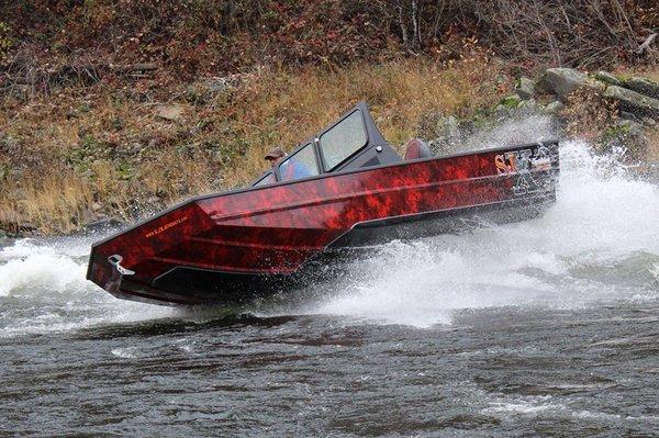 The SJX Jet Boat shown in one of our didi color pattern.