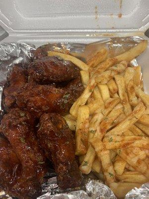 Honey barbecue wings with garlic fries