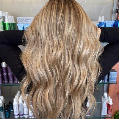 Sun kissed blonde highlights by Jenn