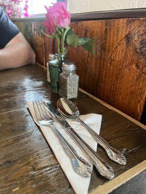 Fresh roses and utensils