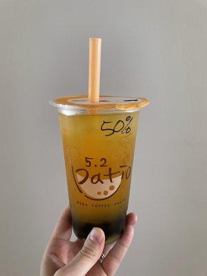 Mango green tea with boba