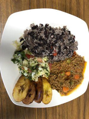 Picadillo + rice w/ beans, sweet plantain and cabbage slaw