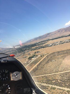 Taking off with tow plane in front