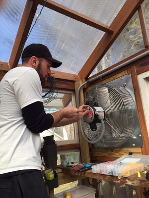 Installing a fan for a greenhouse!