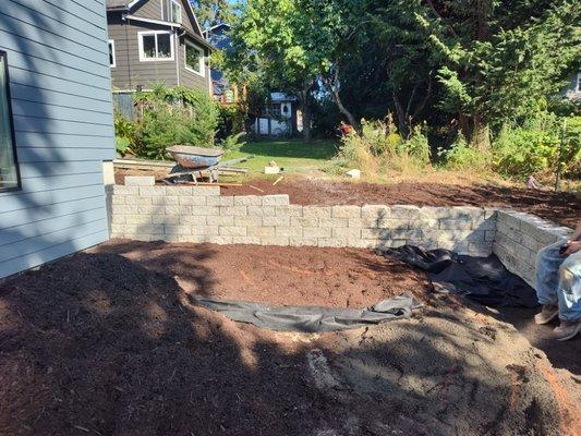 Preparation for landscape with retaining wall