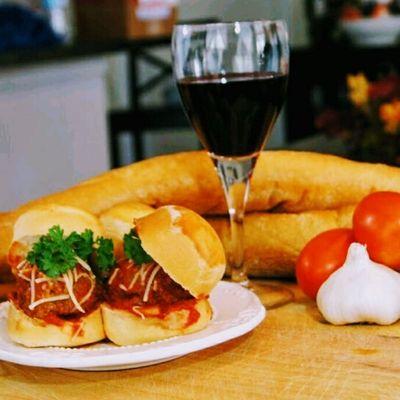 Mama Benedetto's Authentic Italian Meatball Sliders.  Each meatball is hand rolled and served with our from scratch marinara sauce.