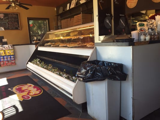 Front counter and display of pizzas