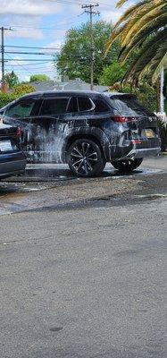 My car being washed by hand