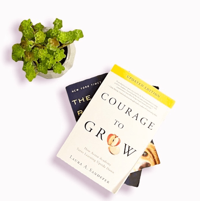 Courage to Grow By Laura Sandefer. A book written about a small school in Austin, Texas, that bloomed into a world wide idea.