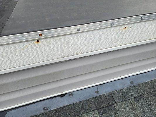 Before: This Rubber membrane roof was not installed properly and within 2 years all the wood around the edges were rotten.