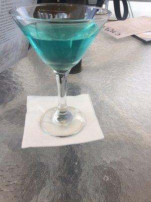 Blue Martini, notice its under poured , also notice there is no garnishment