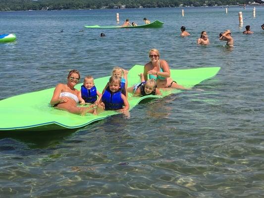 Family having fun on these cool swim mats. So much fun a must try!!!