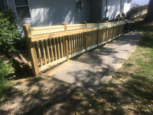 Removed and reset all of the paver steps added a sturdy handrail along the one side including a handrail