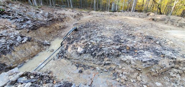 Getting Sewer and Water in Place Clearing of Lot Ready for Foundation!