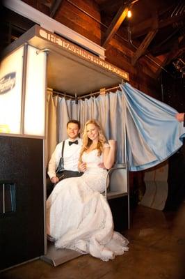 Beautiful couple enjoying our Photo Booth.