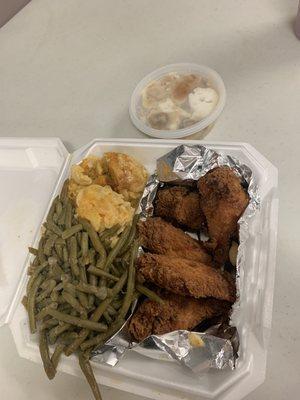 Chicken wings, mac and cheese, green beans, and banana pudding