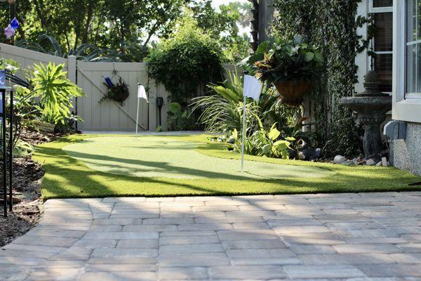 Pavers and Putting green installation for the side of customers home.