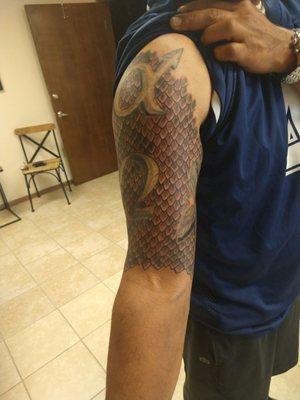 They did the snake scales. Took 11 hours of purely detail work!