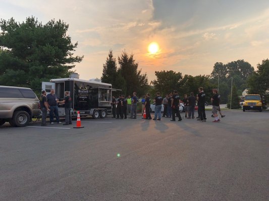 Our mobile catering trailer serving breakfast at a corporate event.