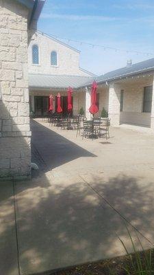 The courtyard. The preschool main entrance is in and to the left. There is a second entrance on the right.