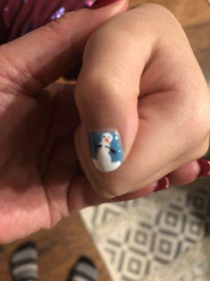 My daughter's snowman nails.