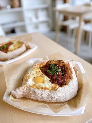 Veggie Khachapuri | eggplants, red bell peppers with tomatoes, and fresh herbs