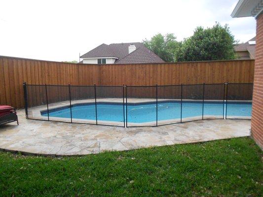 Mesh Pool Fence Connected to Wooden Privacy Fence