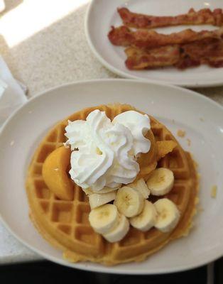 Belgian waffle with a side of bacon