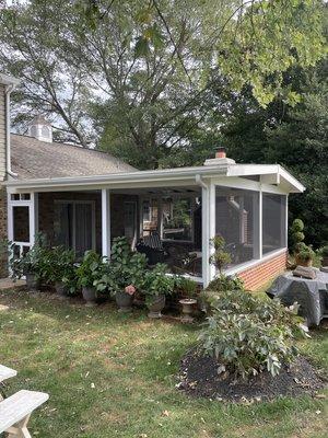 Built a screened in porch with nice trim inside and out