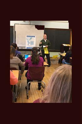 Giving a Posture talk to a school's faculty.  Answering questions and giving out stretches and exercises.  It's all about movement!