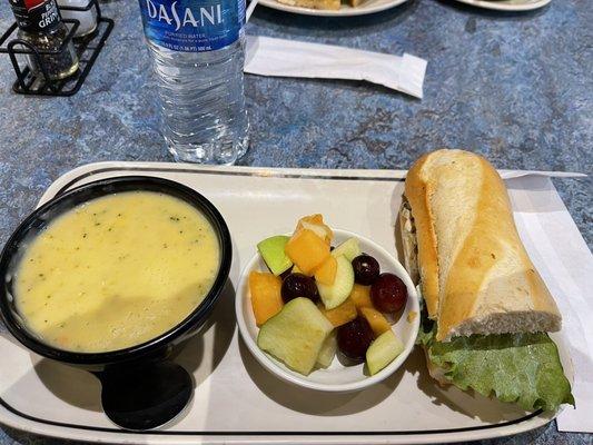 Choose two delicious creamy Cheddar Broccoli Soup , fresh fruit as a side and chicken salad sandwich