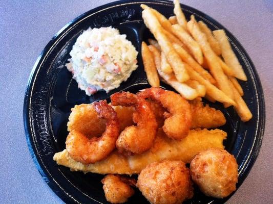 Fish and shrimp meal with cole slaw and fries as sides