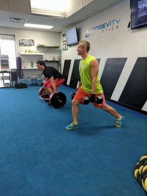 Mark and Sam blending laughter with serious strength training!