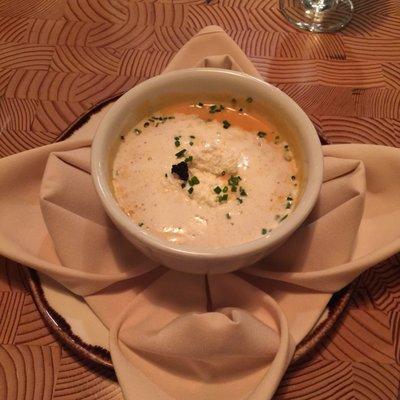 Lobster bisque topped with heavy cream and caviar