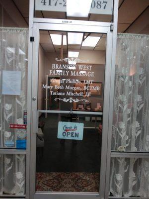 Front door inside Claybough Plaza, lower level. Welcome!