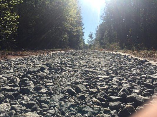 Gravel, driveway, aggregate, grading, road construction, land clearing, access road, nature trail, walking path