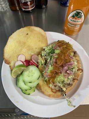 our torta de asada/beef with our amazing toppings!