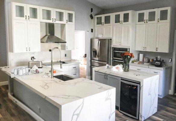 Calacatta quartz on white shaker cabinets