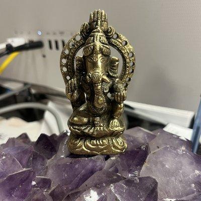 Ganesh statue on purple quartz