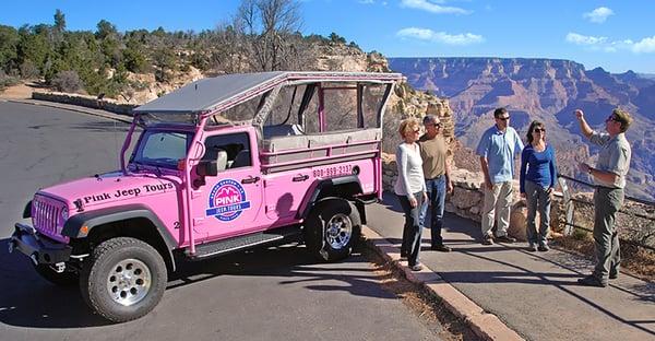 Our Pink Jeeps have see-through covers for inclement weather and interior heating for winter tours.